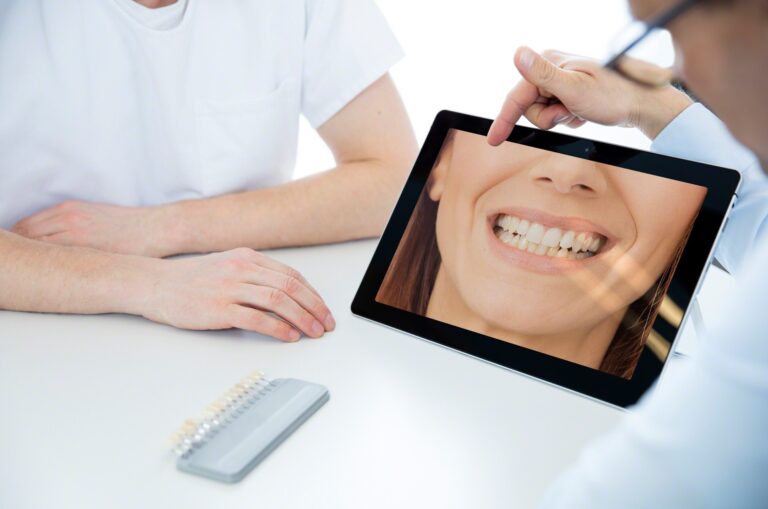 picture of lady smiling on ipad